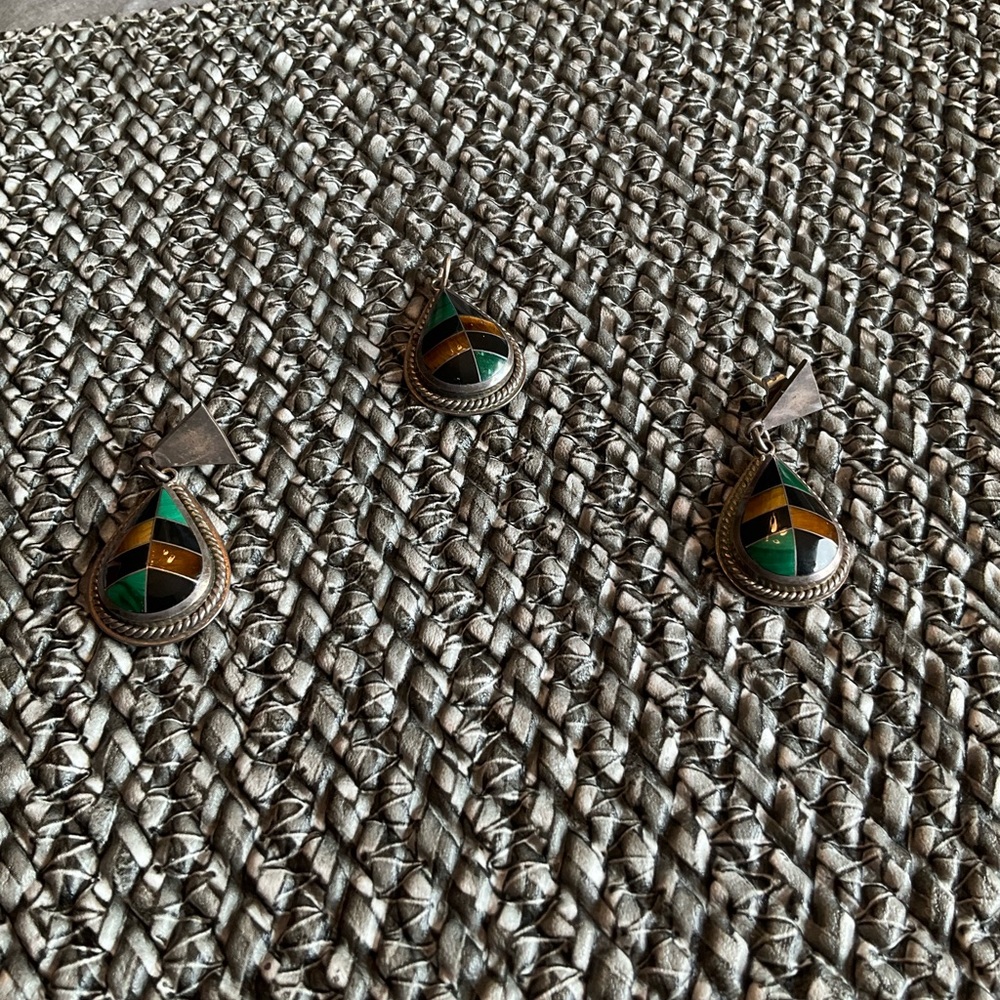 Silver pendant an pierced earrings